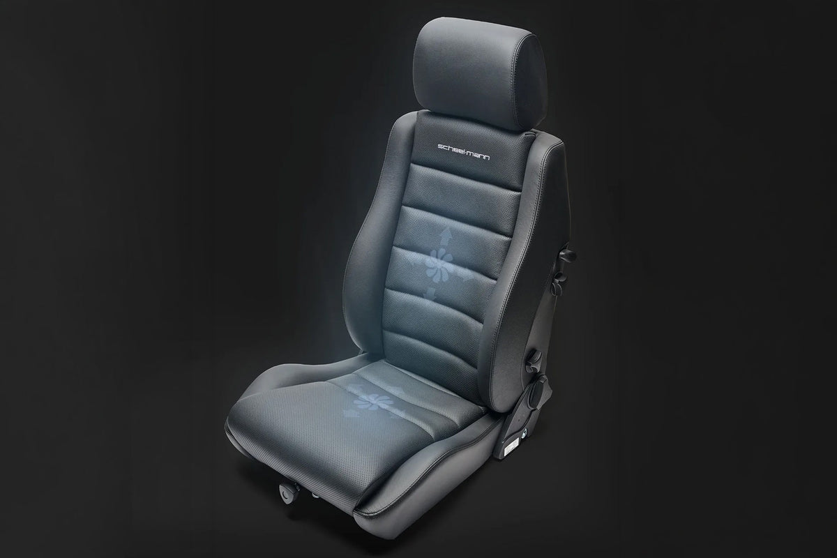 scheel-mann Klima seat in black perforated leather, with glowing fan graphics on the backrest and cushion showing active ventilation