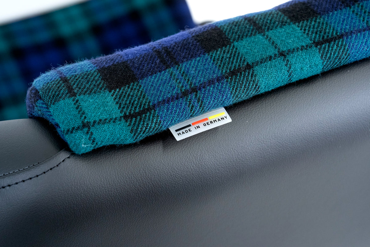 scheel 101 seat in blue green plaid with black bolsters, side bolster and logo detail