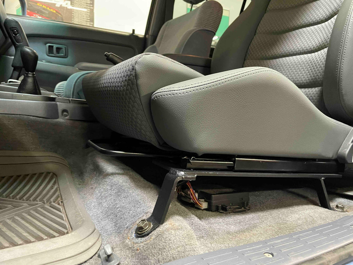 scheel-mann seat on its adapter bracket in a third-generation Toyota 4Runner