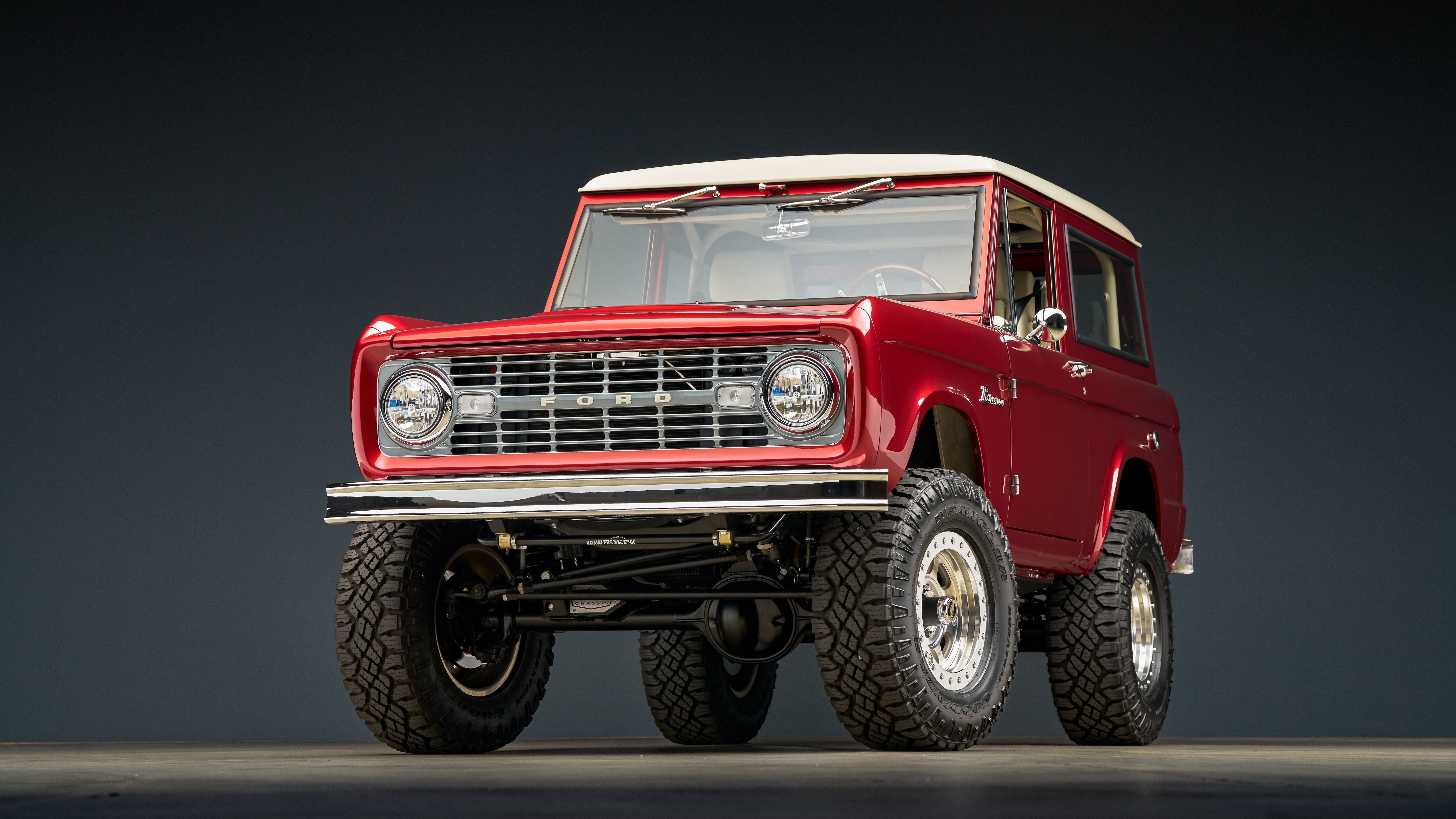 Red Ford Classic Bronco exterior front 3/4 hero shot